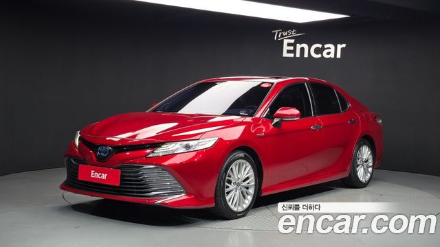 Toyota Camry 2.5 XLE Hybrid — пробег 125 501 км — фото 1 из 5
