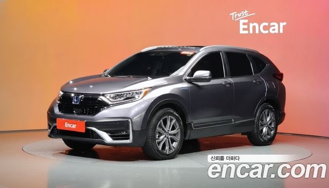 Honda CR-V 2.0 Hybrid Touring 4WD — пробег 85 847 км — фото 1 из 5