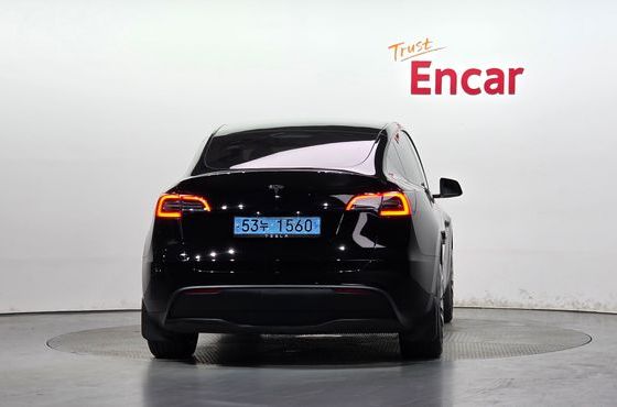 Tesla Model Y RWD — пробег 39 668 км — фото 4 из 5