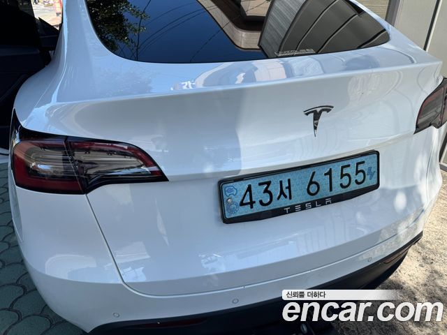 Tesla Model Y Standard Range RWD — пробег 103 200 км — фото 4 из 5