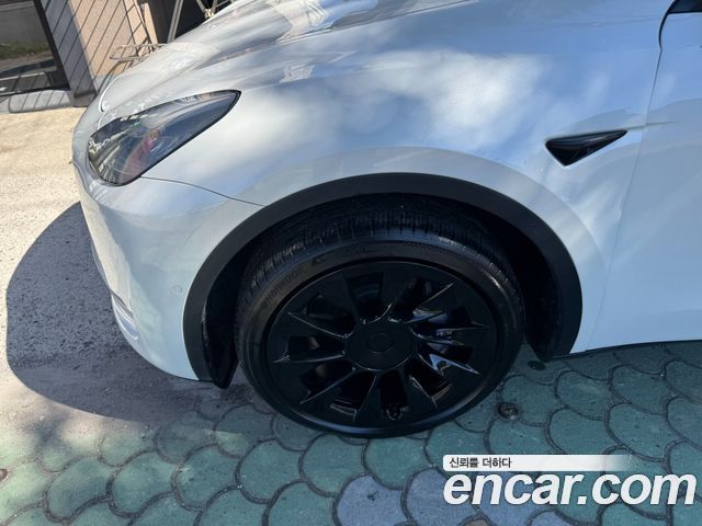 Tesla Model Y Standard Range RWD — пробег 103 200 км — фото 5 из 5
