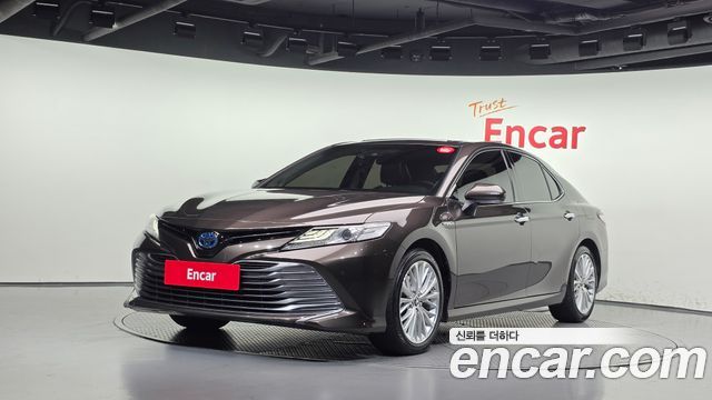 Toyota Camry 2.5 XLE Hybrid — пробег 144 204 км — фото 1 из 5