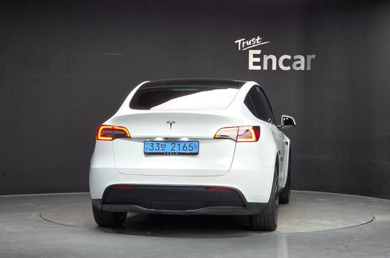 Tesla Model Y RWD — пробег 23 587 км — фото 4 из 5