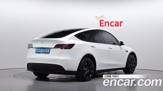 Tesla Model Y RWD — пробег 46 061 км — фото 2 из 5