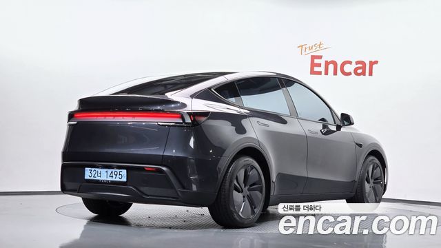 Tesla Model Y RWD — пробег 5 911 км — фото 2 из 5