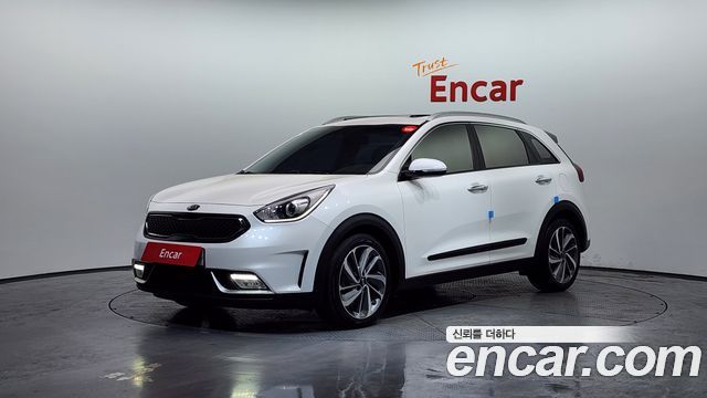 Kia Niro Prestige — пробег 124 520 км — фото 1 из 5