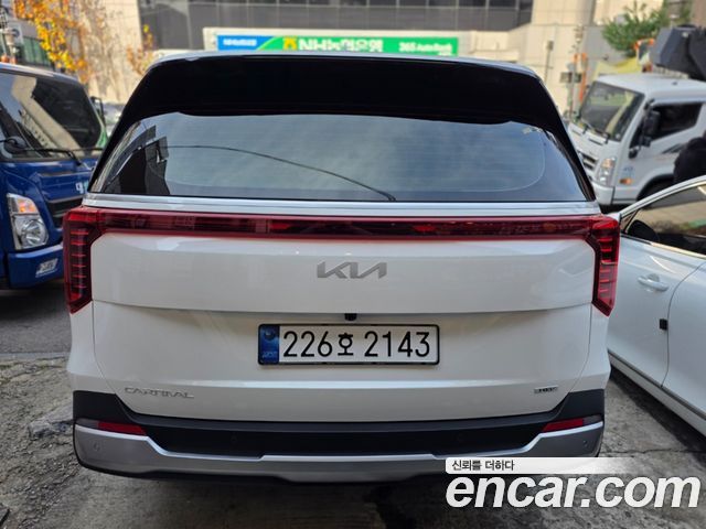 Kia Carnival HEV 9 seater Prestige — пробег 1 800 км — фото 4 из 5