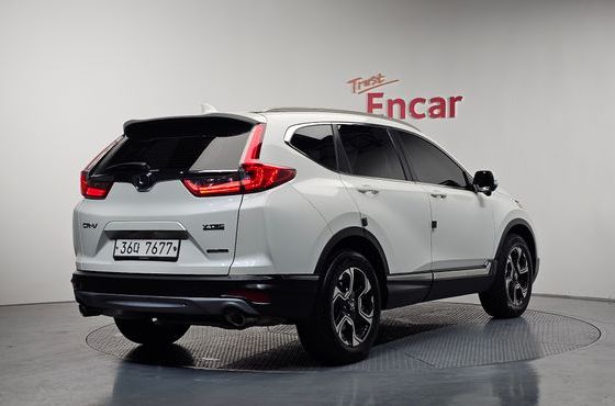 Honda CR-V 1.5 Touring 4WD — пробег 102 691 км — фото 2 из 5