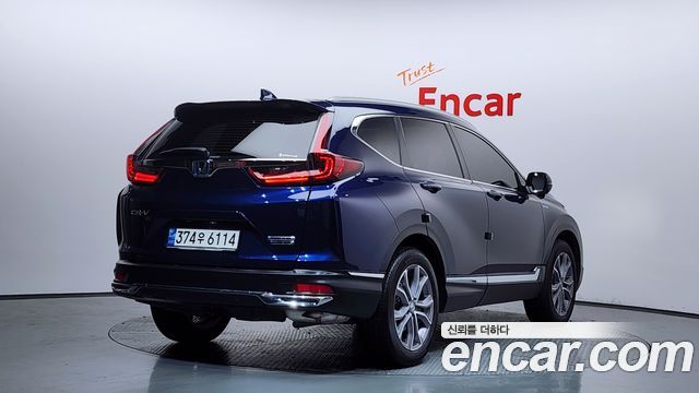 Honda CR-V 2.0 Hybrid Touring 4WD — пробег 29 112 км — фото 2 из 5