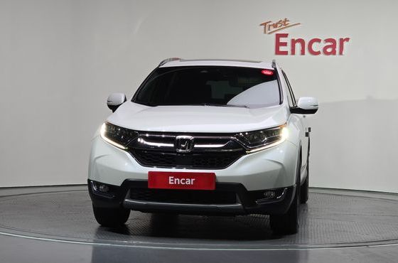 Honda CR-V 1.5 Touring 4WD — пробег 145 008 км — фото 3 из 5