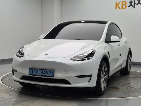 Tesla Model Y Standard Range RWD — пробег 79 497 км — фото 1 из 5
