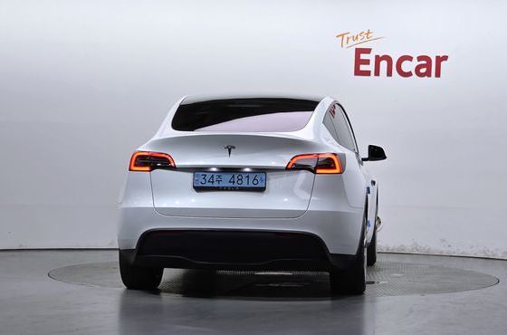 Tesla Model Y RWD — пробег 77 380 км — фото 4 из 5
