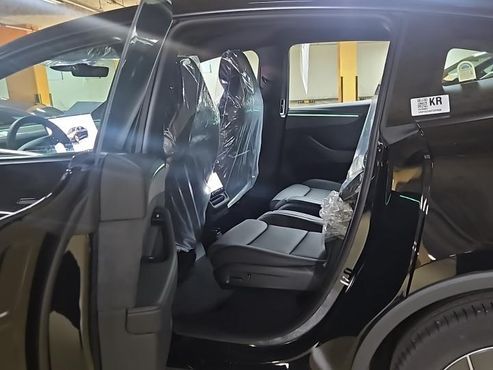 Tesla Model Y L Long Range AWD — пробег 1 км — фото 4 из 5