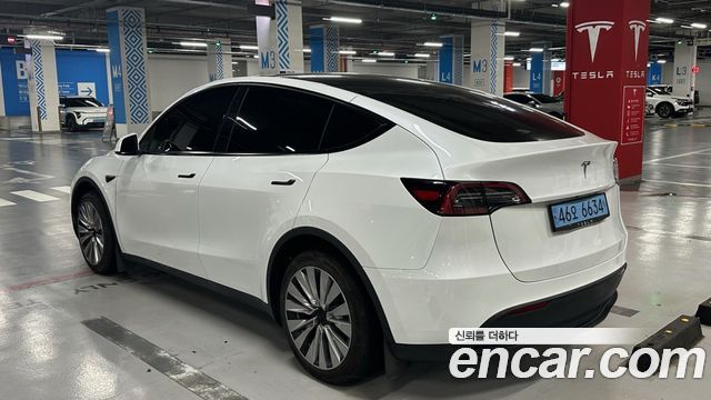 Tesla Model Y RWD — пробег 68 002 км — фото 2 из 5