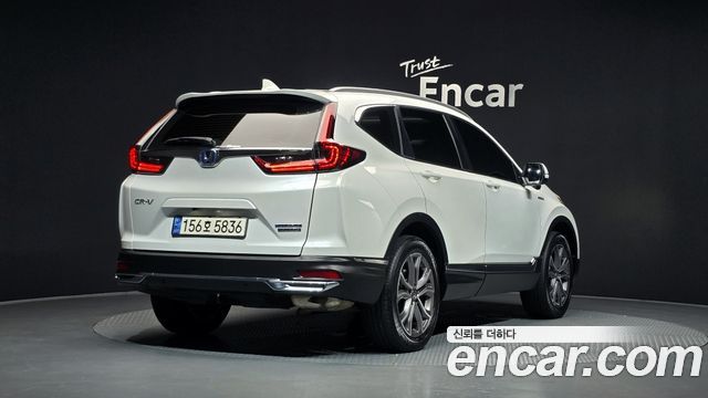 Honda CR-V 2.0 Hybrid Touring 4WD — пробег 54 453 км — фото 2 из 5