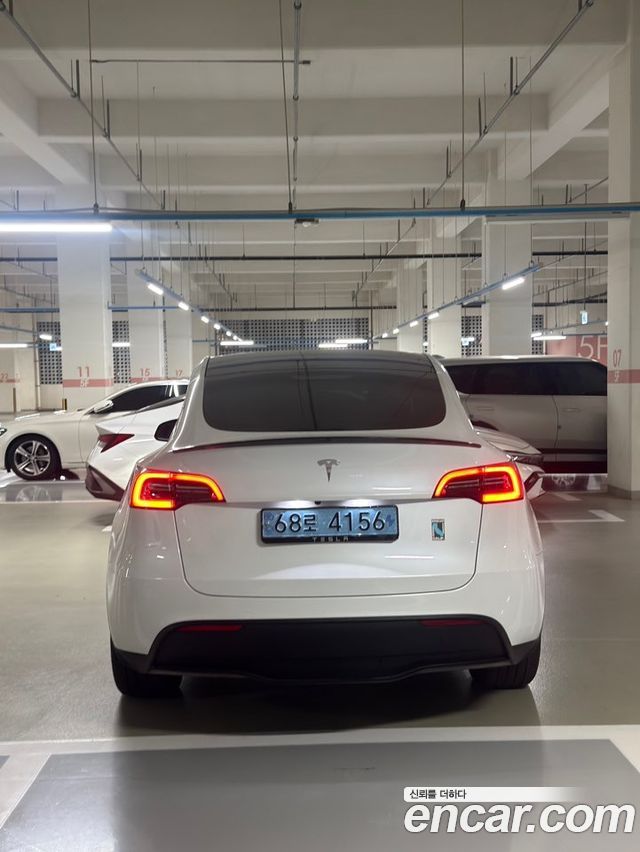 Tesla Model Y RWD — пробег 59 927 км — фото 2 из 5