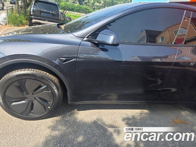 Tesla Model Y RWD — пробег 200 км — фото 1 из 5