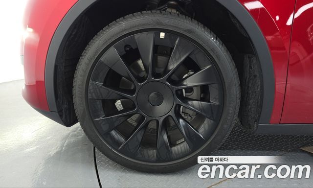 Tesla Model Y RWD — пробег 11 777 км — фото 5 из 5