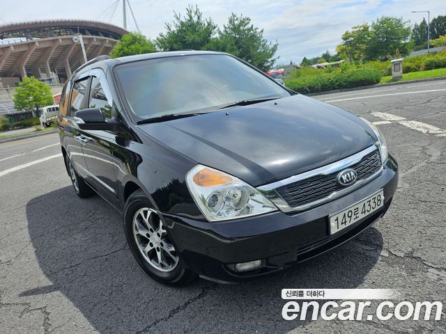 Kia Carnival Grand Carnival GLX Premium — пробег 145 000 км — фото 3 из 5