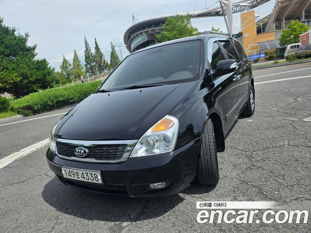 Kia Carnival Grand Carnival GLX Premium — пробег 145 000 км — фото 4 из 5