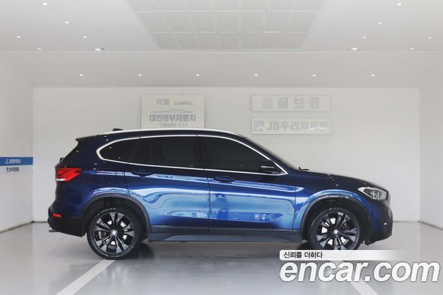 BMW X1 xDrive 20i Advantage — пробег 86 600 км — фото 5 из 5