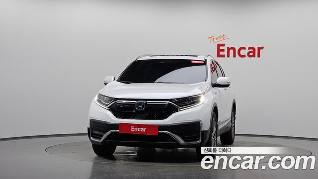 Honda CR-V 2.0 Hybrid Touring 4WD — пробег 63 385 км — фото 3 из 5