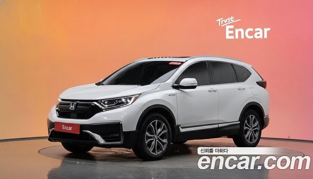 Honda CR-V 2.0 Hybrid Touring 4WD — пробег 63 385 км — фото 1 из 5