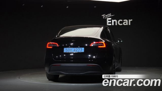 Tesla Model Y RWD — пробег 56 610 км — фото 4 из 5