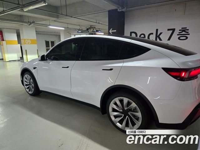 Tesla Model Y Long Range AWD — пробег 21 661 км — фото 2 из 5