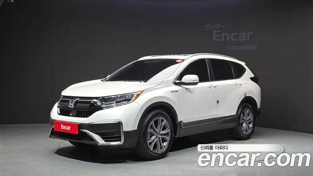 Honda CR-V 2.0 Hybrid Touring 4WD — пробег 45 198 км — фото 1 из 5