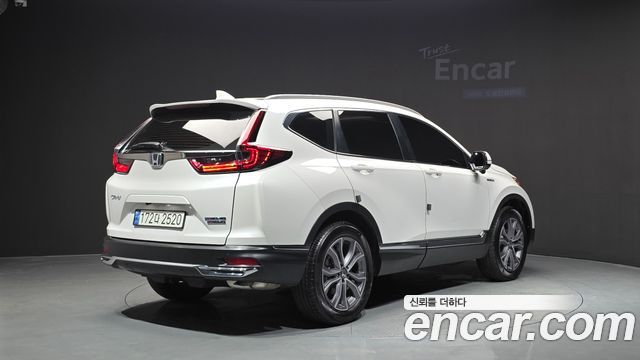 Honda CR-V 2.0 Hybrid Touring 4WD — пробег 45 198 км — фото 2 из 5