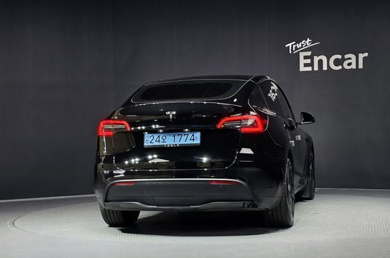 Tesla Model Y RWD — пробег 32 230 км — фото 4 из 5