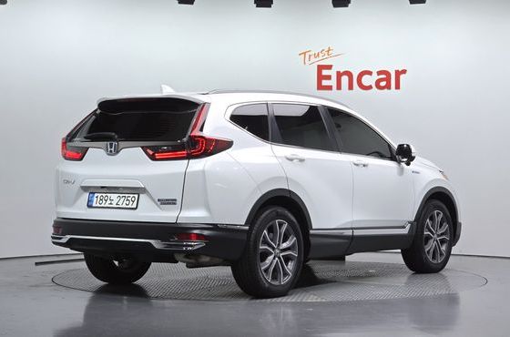 Honda CR-V 2.0 Hybrid Touring 4WD — пробег 55 299 км — фото 2 из 5