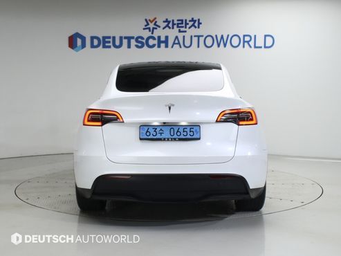 Tesla Model Y RWD — пробег 48 639 км — фото 4 из 5