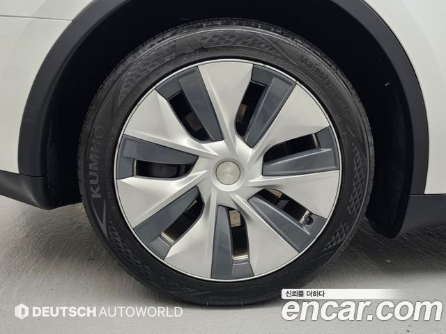 Tesla Model Y RWD — пробег 48 639 км — фото 5 из 5