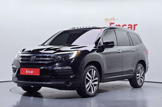 Honda Pilot 3.5 — пробег 121 945 км — фото 1 из 5